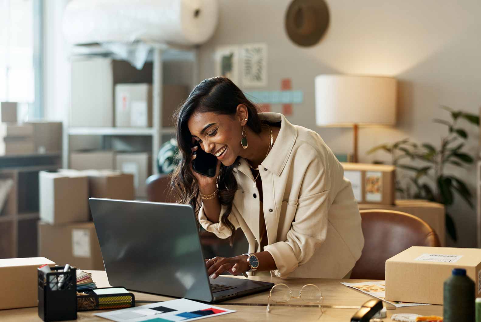 Person talking on phone in small business